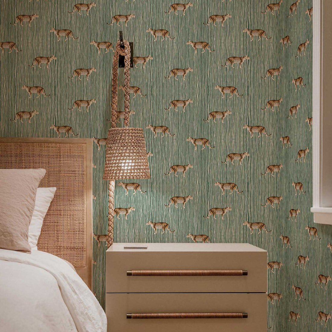 modern boho bedroom with tiger print wallpaper