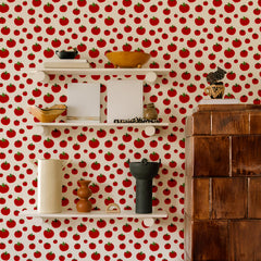 Cream kitchen wallpaper with red tomato pattern and green stems