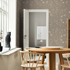 Taupe wildflower wallpaper with delicate white floral silhouette branches