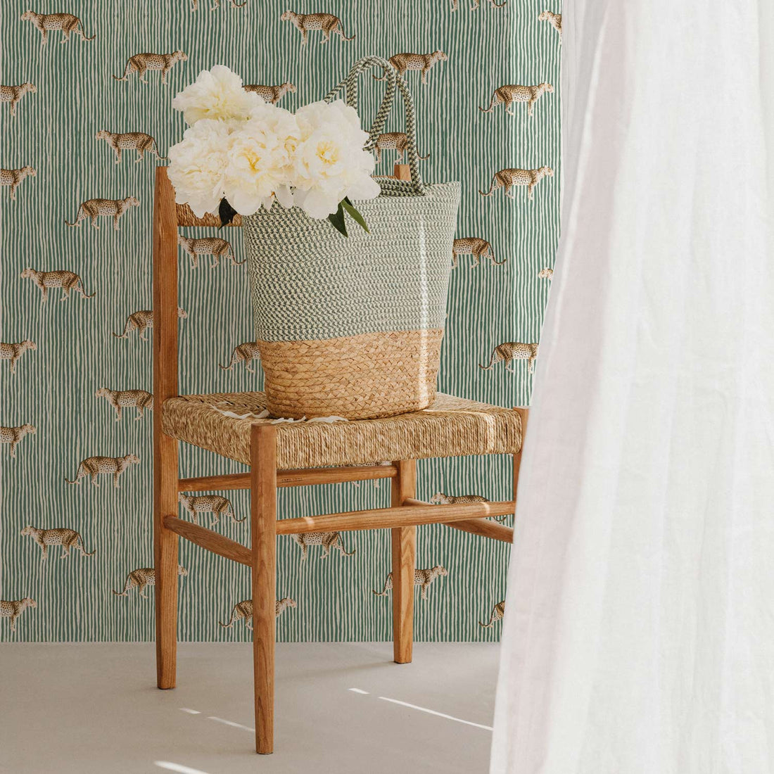 retro green wallpaper with tiger inspired print 