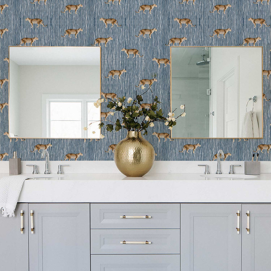 Coastal inspired bathroom interior with leopard wallpaper in blue