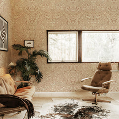 Tan wood grain wallpaper with swirling burl pattern in mirrored symmetry