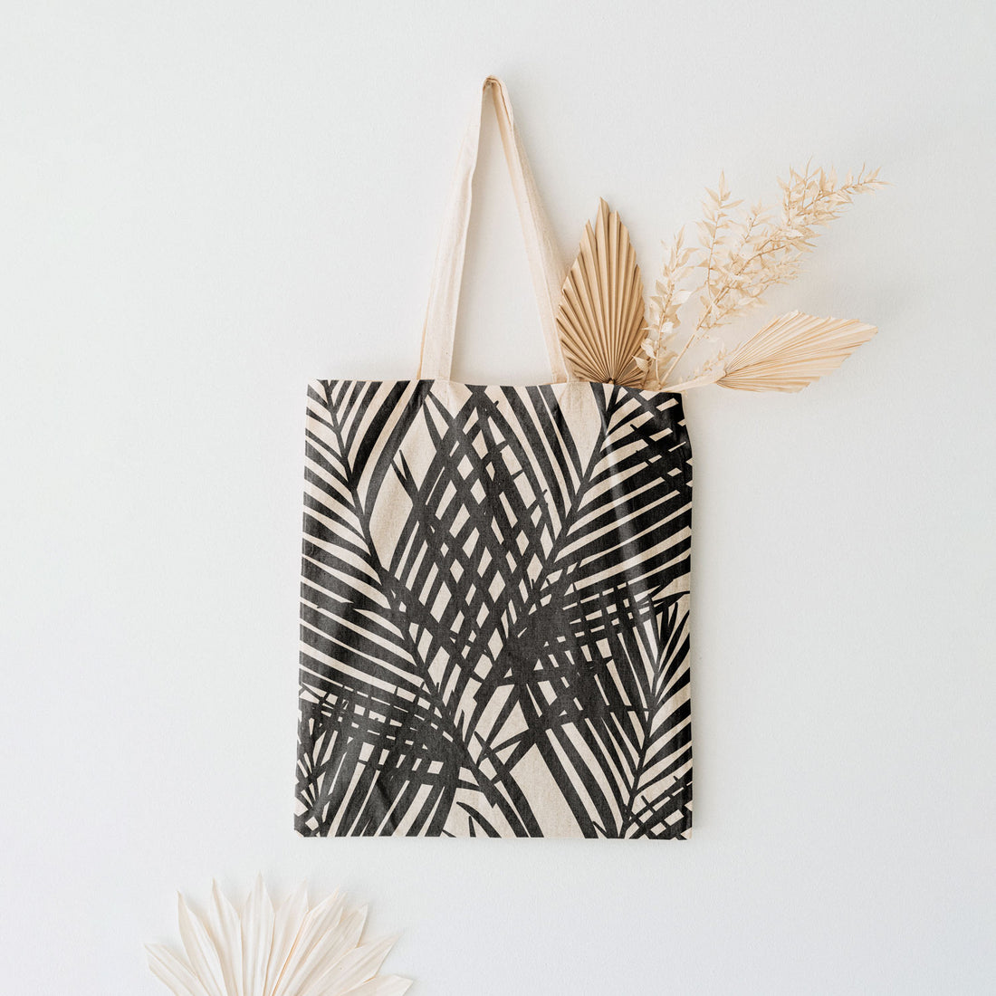elegant tote bag with black and white palm leaf print