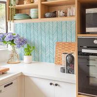 light kitchen design with bright backsplash