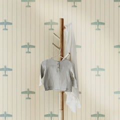 Cream nursery wallpaper with vertical stripes and vintage airplane silhouettes