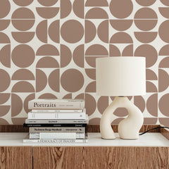 Brown and cream geometric wallpaper with circle and half-circle grid pattern
