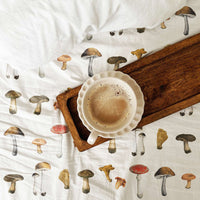 colorful fabric bed cover with mushroom print