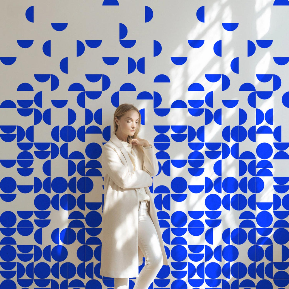 geometric circles print wall mural design in bright blue color
