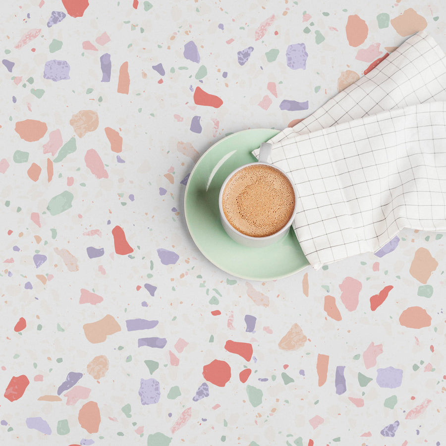 terrazzo inspired wallpaper design in pastel colors for a coffee shop