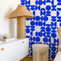 bright blue geometric shapes wall mural for danish inspired bedroom interior