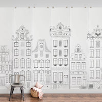 Houses of Amsterdam wall mural in pastel pink girls room interior