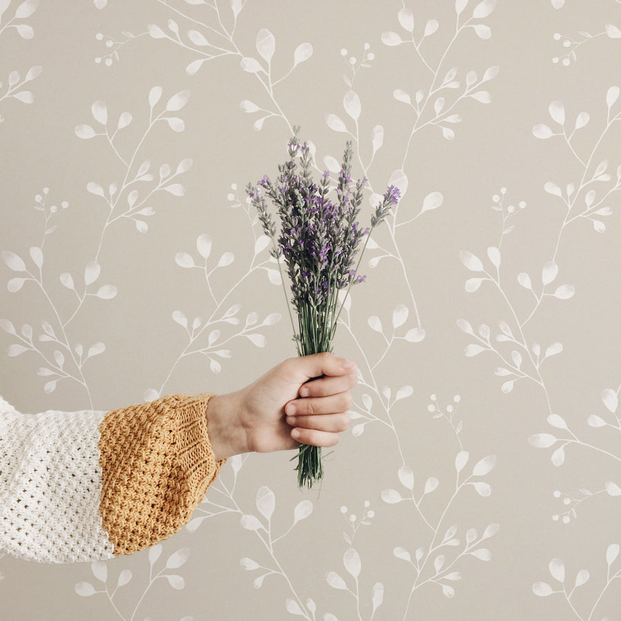 Neutral color floral removable wallpaper in boho girl's bedroom interior