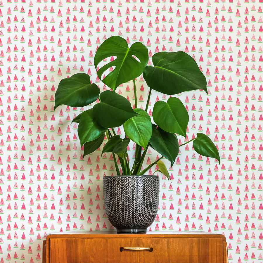 eclectic bedroom interior with tiny pink watermelon print removable wallpaper