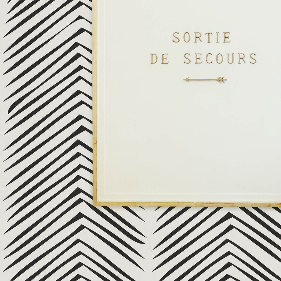 eclectic parisian chic apartment design with classic chevron wallpaper
