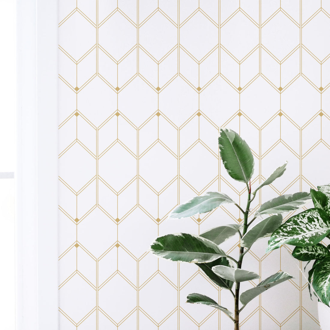 White and gold color removable wallpaper in light interior with greenery decor