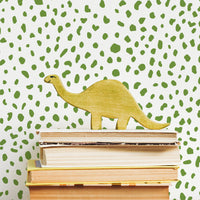 bright green spots pattern wallpaper with dinosaur decor