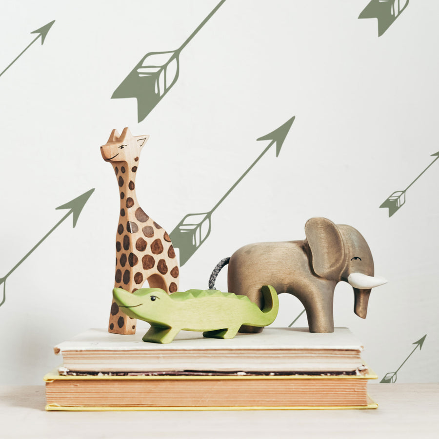 simple arrow inspired wallpaper design for kids playroom in green
