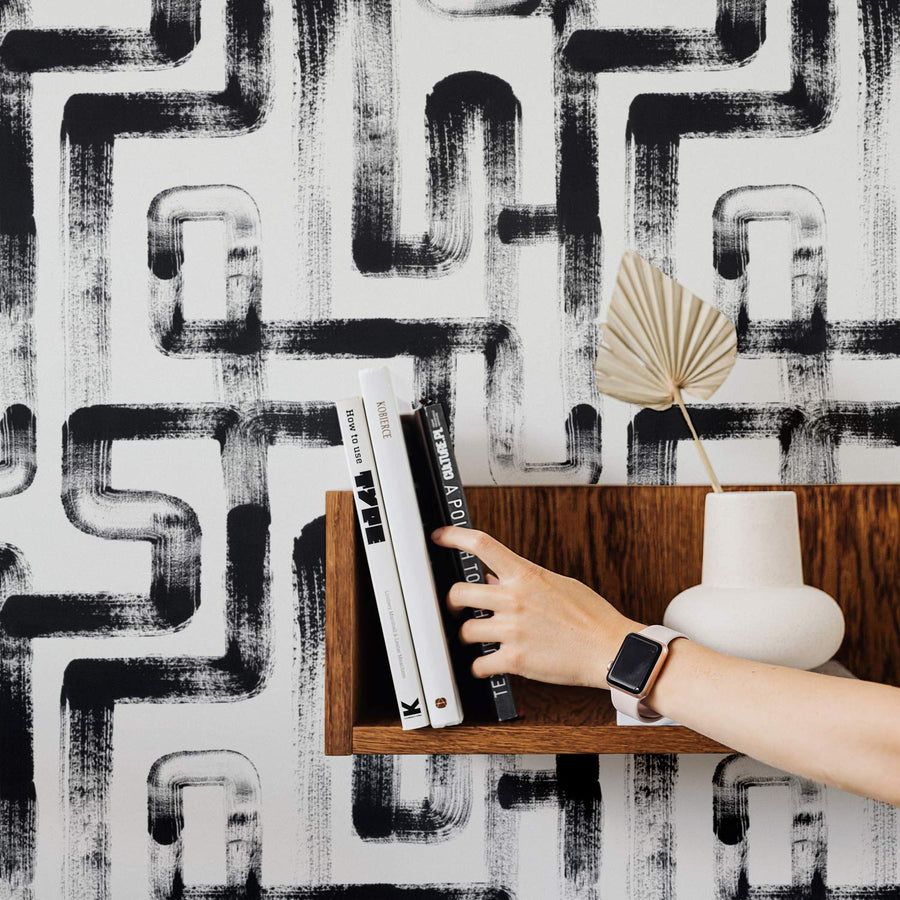 Abstract brush stroke design removable wallpaper in moody interior
