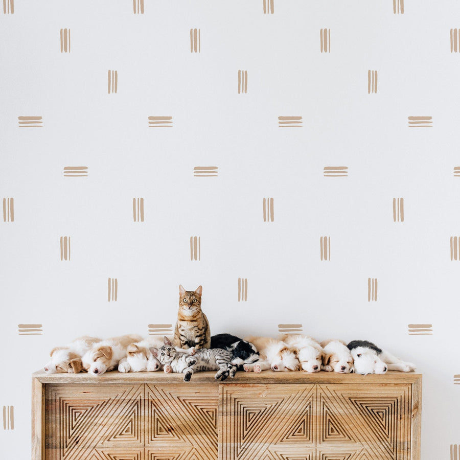 bohemian style kids bedroom with light beige striped wallpaper