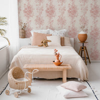 modern bohemian girls bedroom interior with light pink vintage florals inspired wallpaper