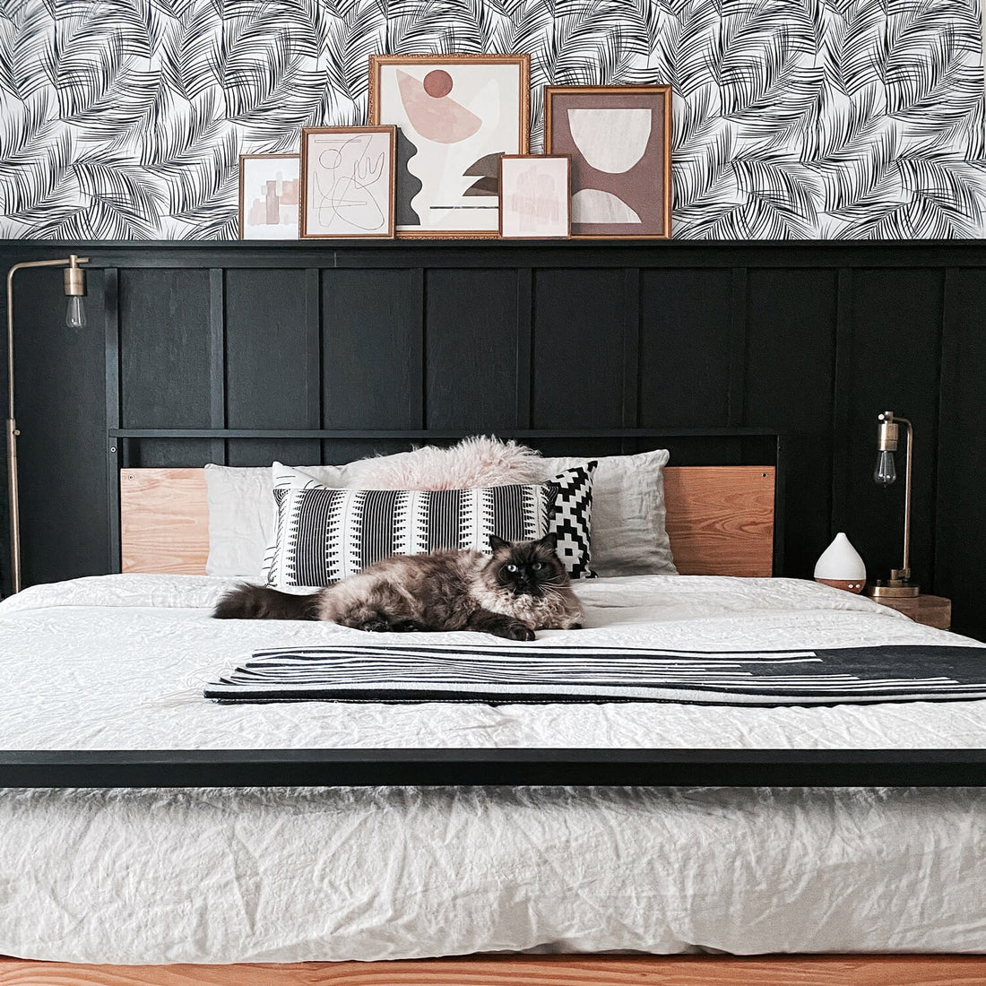 modern boho bedroom design with minimal tropical wallpaper