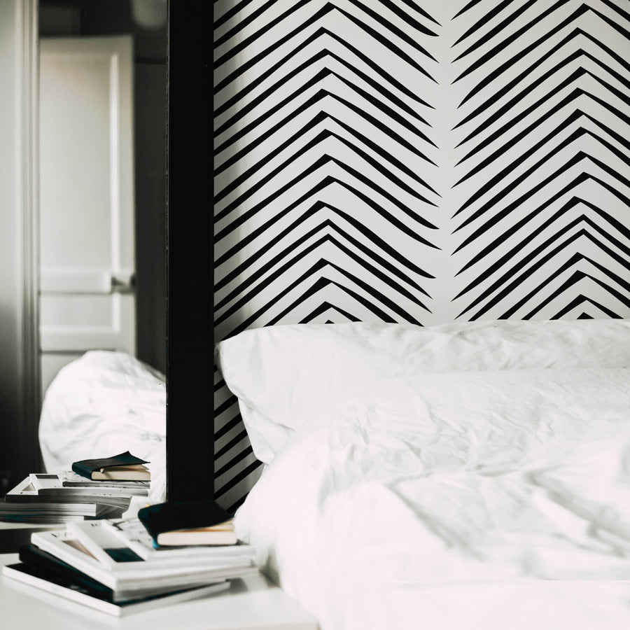 modern black and white french apartment design with striped wallpaper