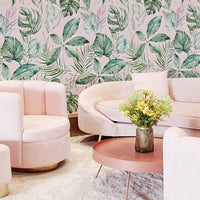 Palm Springs living room interior with pink velvet sofa and tropical removable wallpaper