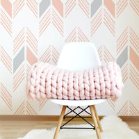 Pastel pink aztec print removable wallpaper in tribal girl's room interior