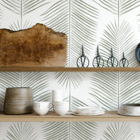 green palm leaf wallpaper in modern farmhouse kitchen interior and shelf styling