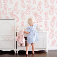 tropical print wallpaper with pink pineapples for baby girls bedroom interior