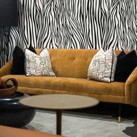 urban jungle style loft interior with zebra print wallpaper