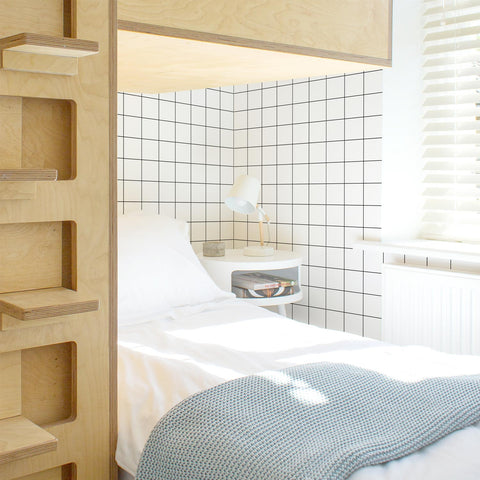 Large checkers wallpaper for kid's room interior