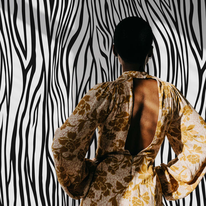 monochrome animal print wallpaper in walk in closet
